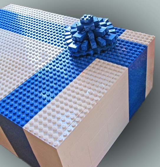 Empaqueta los libros de regalo para niños dentro de una caja de legos